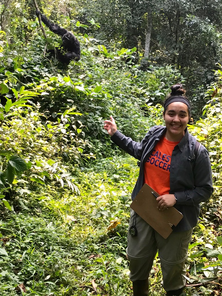 Risa and a chimpanzee, Kibale National Park, Uganda
