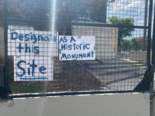 Figure 9. Posters affixed to the fence that surrounded the remnants of the burnt down 3rd Precinct police station. June 4, 2020 (personal photo). 